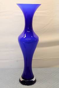 lot 156 image: Elegant Blue Glass Vase with Unique Curved Design