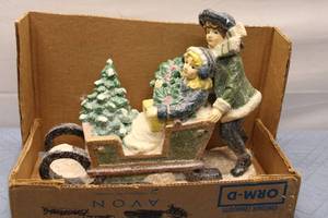 lot 170 image: Vintage Christmas Decoration Figurine of Children on Sleigh with Christmas Trees
