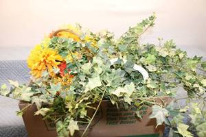 lot 245 image: Assorted Silk Floral Arrangement in Woven Basket