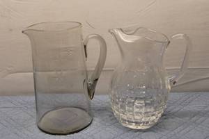 lot 264 image: Set of 2 Glass Pitchers - Clear and Textured Designs