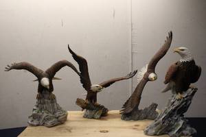 lot 281 image: Collection of 4 Bald Eagle Figurines on Natural Stone Bases
