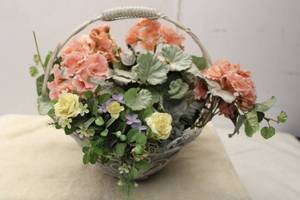lot 367 image: Artificial Flower Arrangement in Wicker Basket