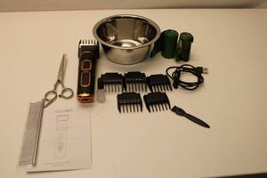 lot 585 image: Electric Pet Grooming Kit - Holdog Clipper with Accessories