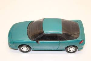 lot 626 image: ERTL 1990 Corvette ZR-1 Model Car in Polo Green - Collectible