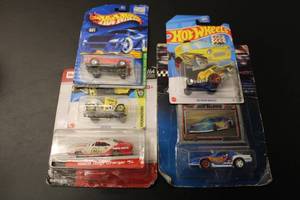 lot 628 image: Lot of 3 Hot Wheels Cars - Limited Editions including 1965 Dodge Charger and Yellow Gotta Go