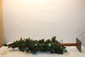 lot 658 image: Vintage Christmas Tree Base with Colorful Lights and Pine Cones