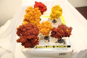 lot 669 image: Woodland Scenics Fall Tree Set - 6 Assorted 3 Trees in Red, Yellow, and Brown