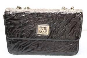 lot 735 image: Vintage Black Patent Leather Handbag with Chain Strap and Lion Emblem