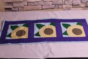 lot 15 image: Quilted Table Runner with Sunflower Design