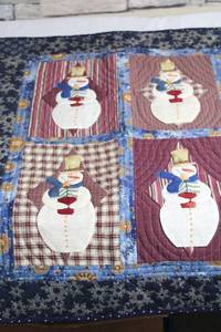 lot 16 image: Handmade Holiday Quilt Featuring Cheerful Snowmen Design