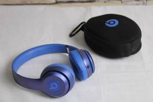 lot A-23 image: Beats by Dre Wireless Headphones in Blue with Carrying Case