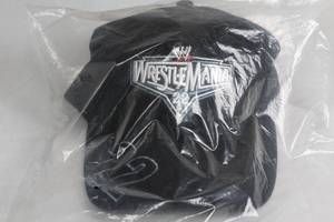 lot 29 image: WWE WrestleMania 22 Authentic Black Cap - New in Package