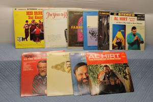 lot 60 image: Collection of 8 Vintage Vinyl Records Featuring Al Hirt, Glenn Miller, and More