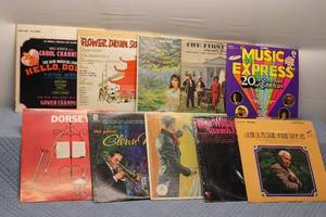 lot 77 image: Lot of 8 Vintage Vinyl Records Including Music Express and Hello, Dolly