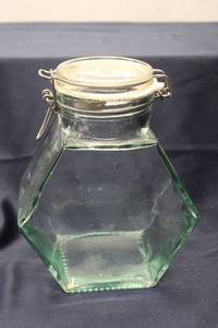 lot 102 image: Vintage Hexagonal Glass Storage Jar with Clip Lid - 8 Inches Tall