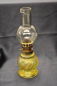 lot 104 image: Vintage Glass Oil Lamp with Ornate Yellow Base and Glass Shade