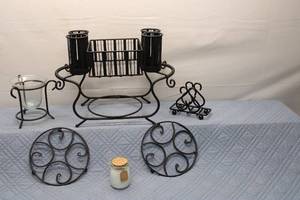 lot 108 image: Vintage Black Metal Candle Holder and Trivet Set