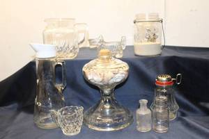 lot 119 image: Collection of Vintage Glassware including Pitchers, Canister, and Decorative Items