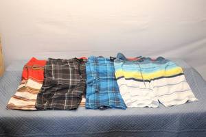 lot 123 image: Lot of 4 Mens Swim Trunks - Various Styles and Designs, Size 34