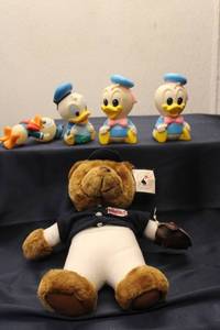 lot 141 image: Collectors Set of Disney Duck Figurines with Minnesota Twins Plush Bear