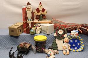 lot 173 image: Vintage Holiday Decoration Collection with Santa Figurines, Doll, and Decorative Bowl