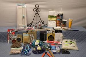 lot 181 image: Assorted Craft Supplies including Glue, Buttons, and Beads