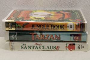lot 232 image: Lot of 7 VHS Tapes Including Disney Classics and Hanna Barbera Favorites