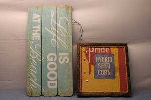 lot 235 image: Set of 2 Decorative Signage - Life is Good at the Beach and Hybrid Seed Corn
