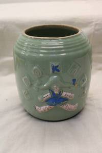 lot 267 image: Vintage Green Glazed Pottery Cookie Jar with Clown Design