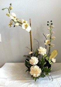 lot 79 image: Three Decorative Faux Florals