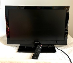 lot 84 image: Toshiba 23 Inch LCD TV  DVD Player