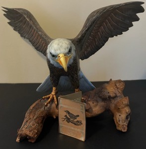 lot 108 image: Bald Eagle on Branch Figurine by Hai Feng Ltd