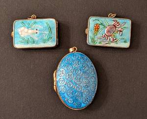 lot 257 image: Three Enamel Pendant Lockets