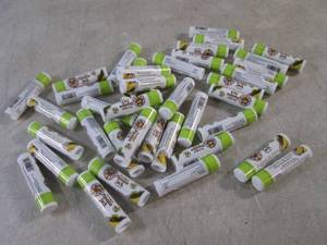 lot 174 image: (EC1) 36 Tropical Lip Balm The Orig...