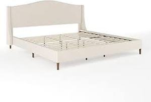 lot 1 image: Martha Stewart Amelia Platform Bed with Curved Headboard and Cushioned Side Rails, Faux Linen Upholstery, Wood Slat Foundation, No Box Spring Needed, King, Beige