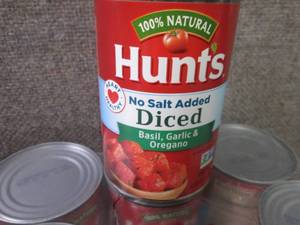lot 83 image: 12- 14.5 oz Hunts No Salt Added Ba...