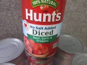 lot 84 image: 12- 14.5 oz Hunts No Salt Added Ba...