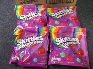 lot 86 image: 4- 12 oz Wild Berry Skittles Gummie...