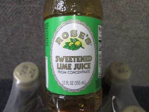 lot 125 image: 6- 12 oz Roses Sweetened Lime Juic...