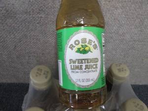 lot 126 image: 6- 12 oz Roses Sweetened Lime Juic...