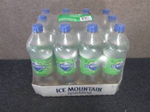 lot 129 image: 12- 33.8 oz Ice Mountain Zesty Lime...