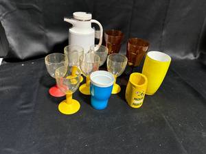 lot 6 image: Colorful Assortment of Plastic and Glass Drinkware with Pitcher
