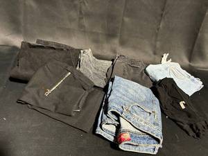 lot 87 image: Assortment of 8 Gently Used Pants and Jeans - Various Styles and Colors