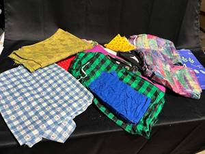 lot 90 image: Assortment of 9 Fabric Pieces - Variety of Colors and Patterns
