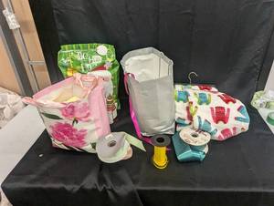 lot 169 image: Collection of Craft Supplies Including Ribbons, Fabric, and Holiday Bags