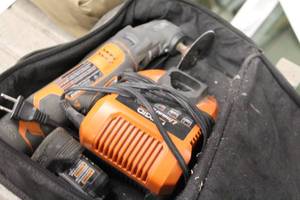 lot 591 image: Ridgid Cordless Angle Grinder with (2) Batteries, Charger