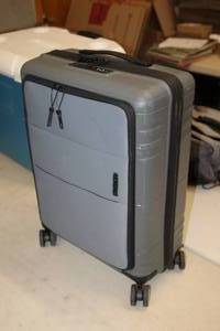 lot 546 image: American Tourister Rolling Suitcase