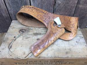 lot 226 image: Real Tooled Leather Pistol Holster with Toy Buckeroo