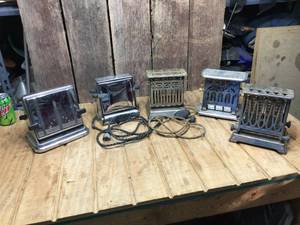 lot 313 image: Antique Toaster Group