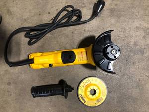 DEWALT 11 Amp Corded 4.5 in. Small Angle Grinder  Customer Returns See Pictures